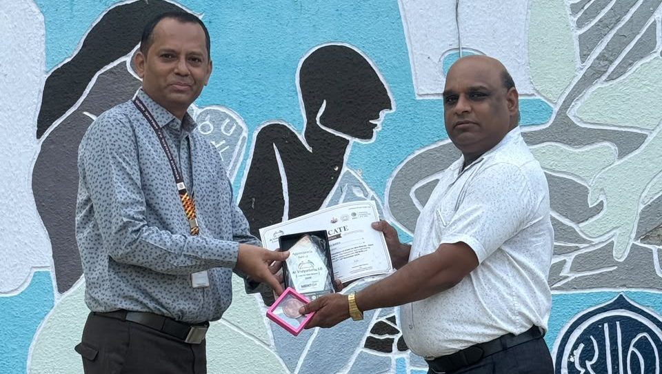 certificate with award and momento distribution to Sh. Khumendra Bisen, PGT (CS)