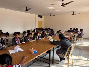 STUDENTS ARE READING BOOKS LIBRARY
