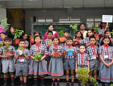 Class 4 students with palnts