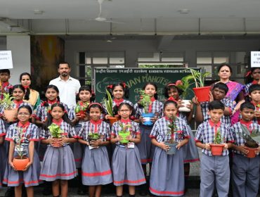 Class 6 students with palnts