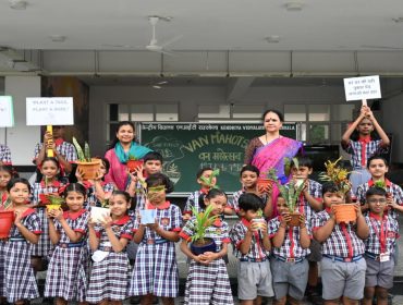 Class 2 students with palnts