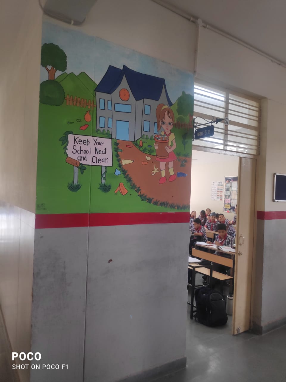 painting on wall by students