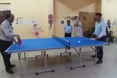 TEACHERS PLAYING TABLE TENNIS