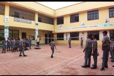 STUDENTS PLAYING BADMINTON