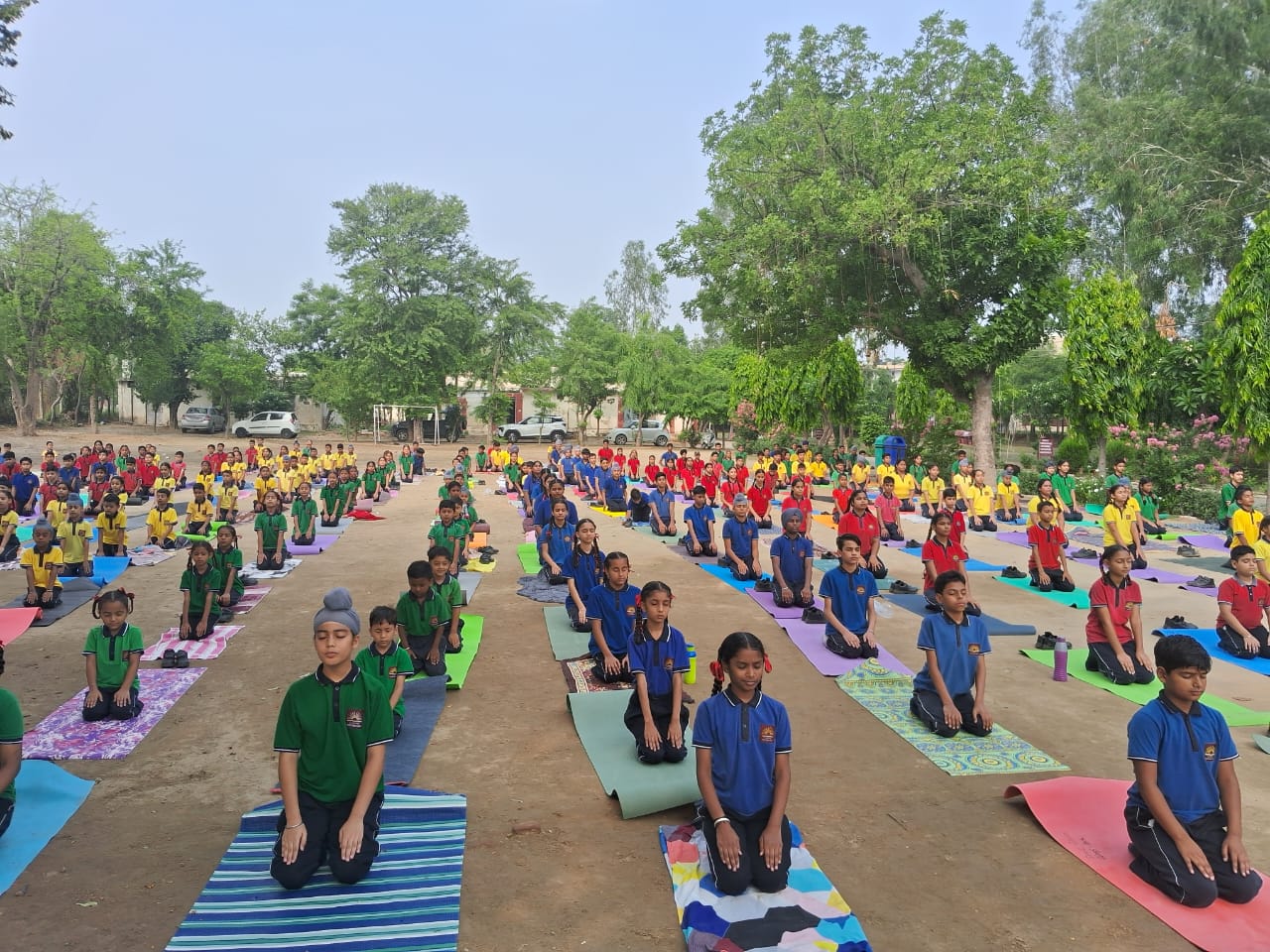 STUDENTS PERFORMING YOGA
