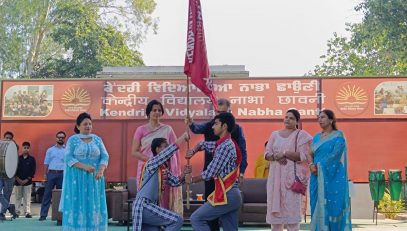 INVESTITURE CEREMONY HEAD BOY AND HEAD GIRL CARRYING FLAG