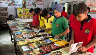STUDENTS ENJOYING BOOKS EXHIBITION