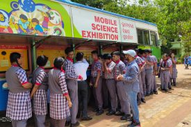 students taking overview of mobile science exhibition