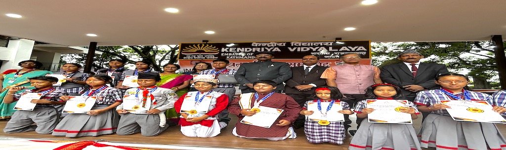Principal Awarding Children who had 100% attendance during Independence Day Program