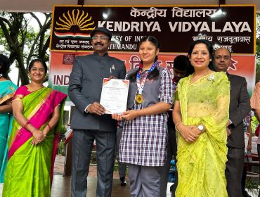 Students who got 100 percent attaendace are being awarded