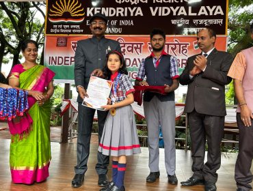 Students who got 100 percent attaendace are being awarded