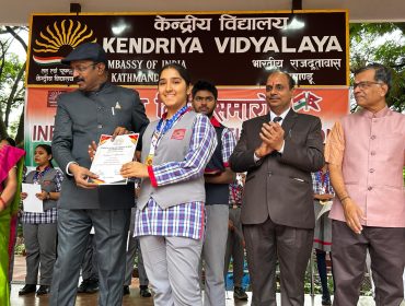 Students who got 100 percent attaendace are being awarded