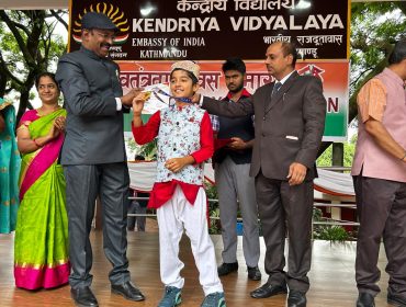 Students who got 100 percent attaendace are being awarded