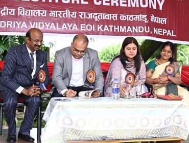 Chairman VMC, Signing Vidyalaya Magazine
