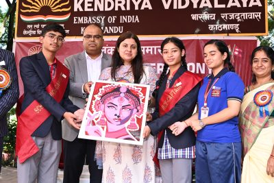 Children presenting Painting as memento to the Guest of Honor
