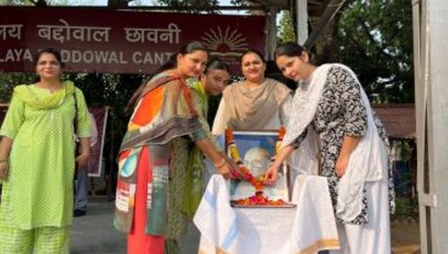 MRS SNOWVER GIVING HOMAGE TO GANDHIJI