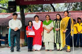 renuka madam giving certificate to student