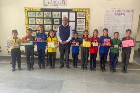 Primary students demonstrating handicrafts