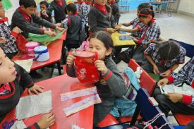 Students making a cloth bag